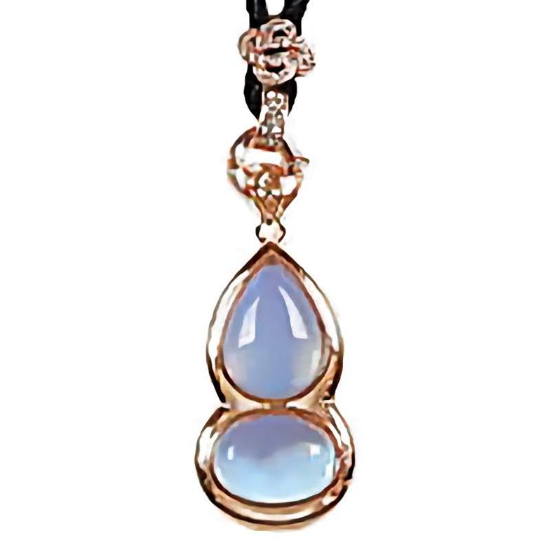 Detail van blauwe edelstenen ketting met opaal hanger en rosé goud | Sea Opal Gold
