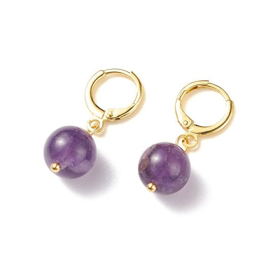 Paarse edelstenen oorbellen met amethist en goud edelstaal liggend | Gold Amethyst Ball