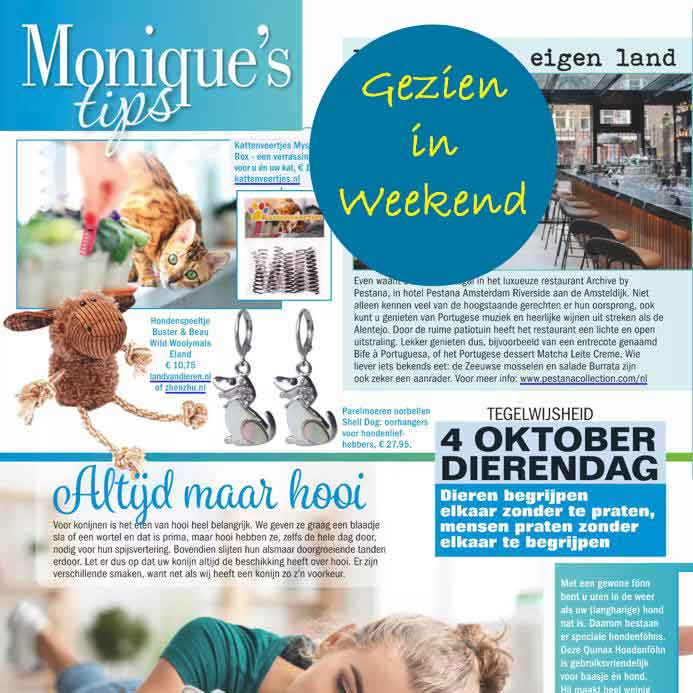 Oorringen met parelmoeren hanger in vorm van hond met stras stenen en zilver edelstaal gezien in tijdschrift Weekend | Shell Dog