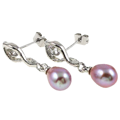 Roze zoetwater parel oorbellen met stras steentje liggend | Lepa