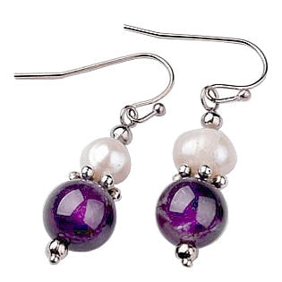 Witte zoetwater parel oorbellen met amethist en sterling zilver (925) liggend | Amilia Amethyst