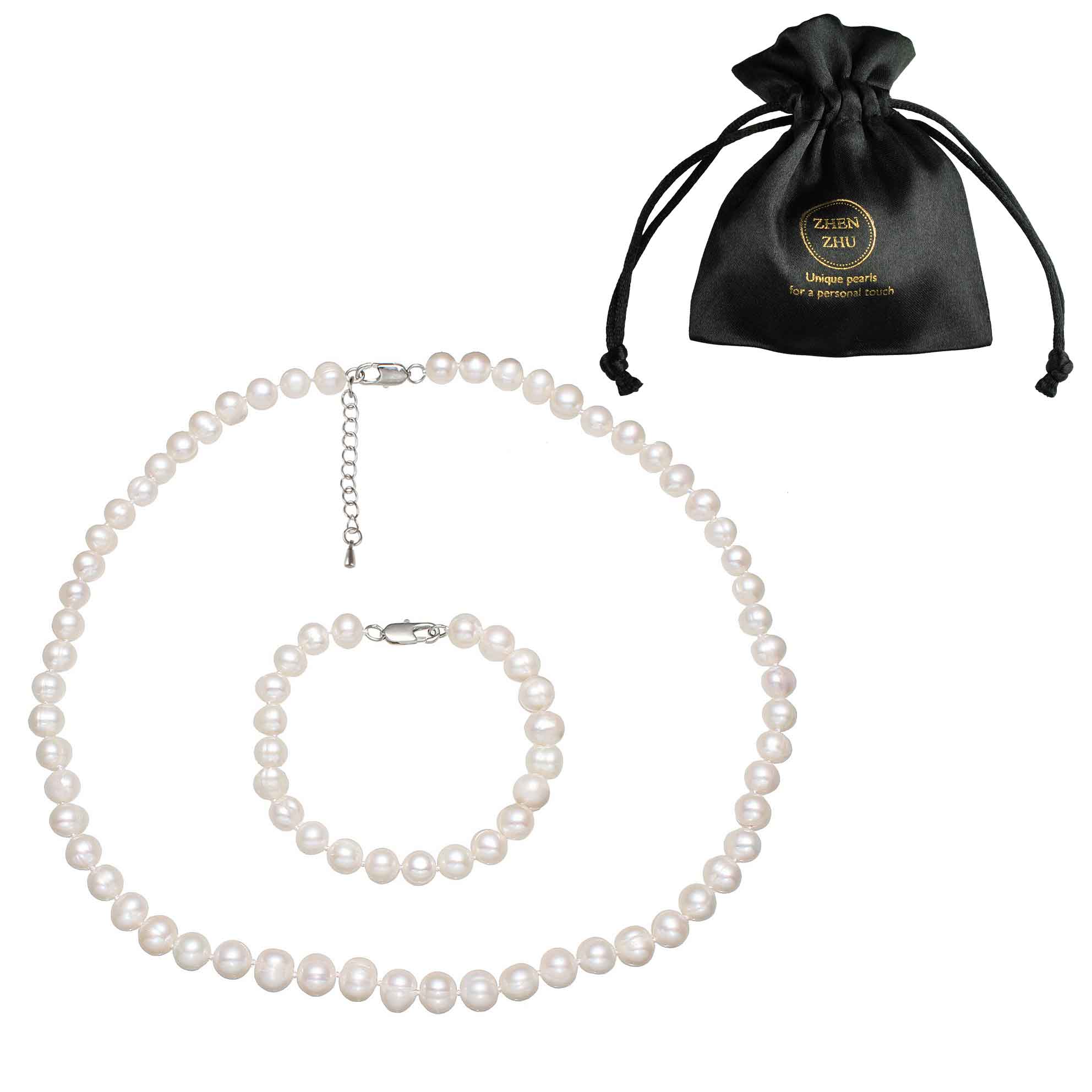 Witte zoetwater parel set met sterling zilveren slotjes bestaande uit een witte parelketting en witte parel armband met sieraden zakje | set Bella (KA)