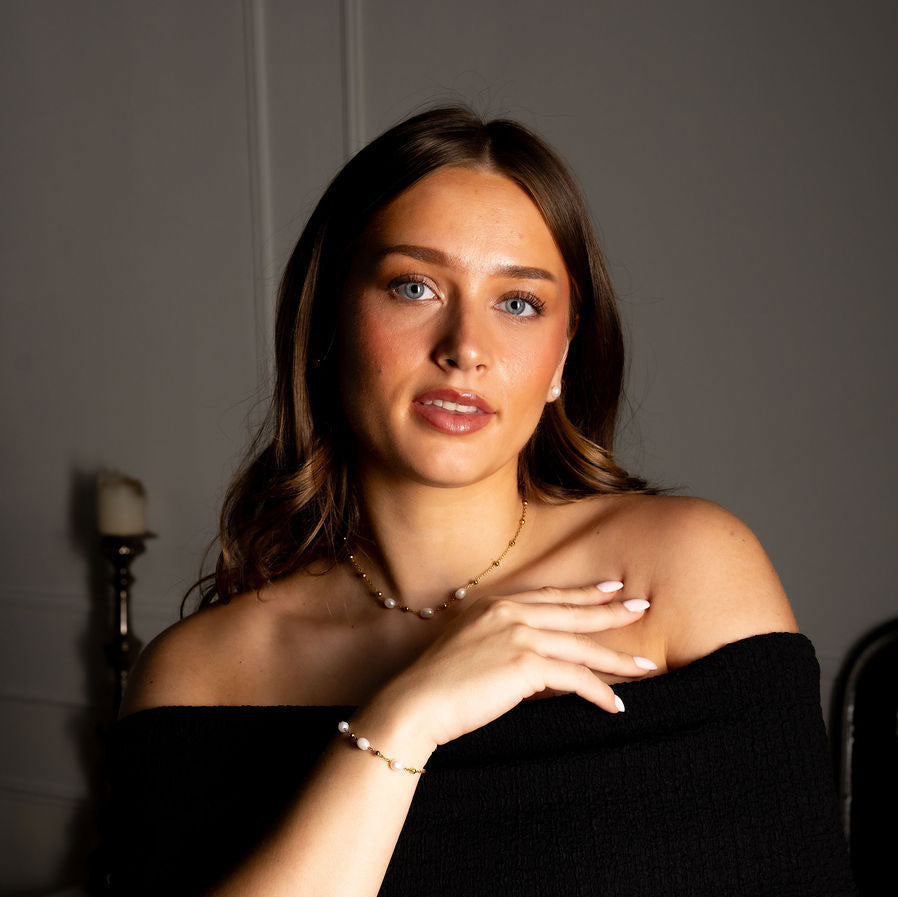 Witte zoetwater parelketting met goud edelstaal met model | Parelketting Eline Goud