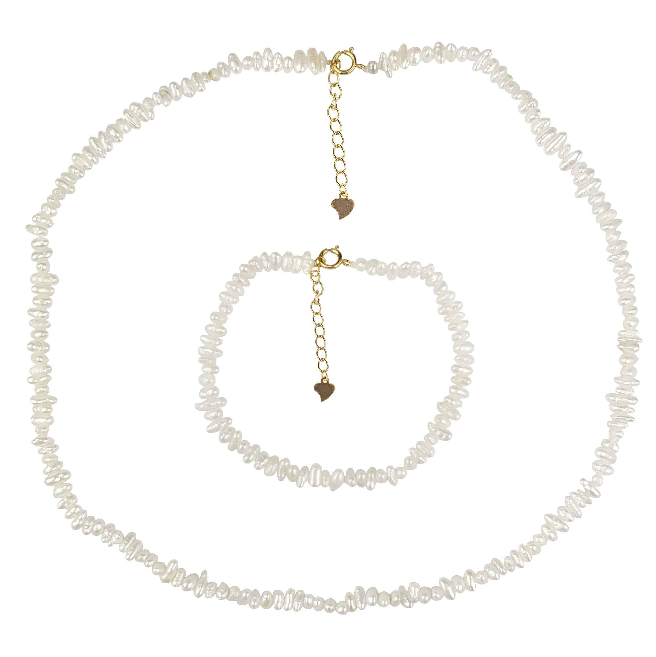 Zoetwater parelketting met kleine witte parels liggend op leisteen | Mily
