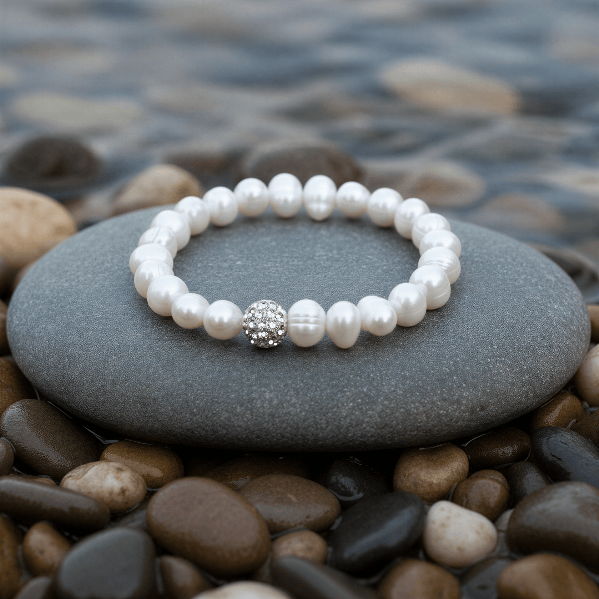 Maxima Small armband bij water - variatie