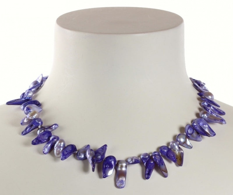 Handgeknoopte zoetwater parelketting met lila kleurige parels en sterling zilver (925) op buste | Purple Blister