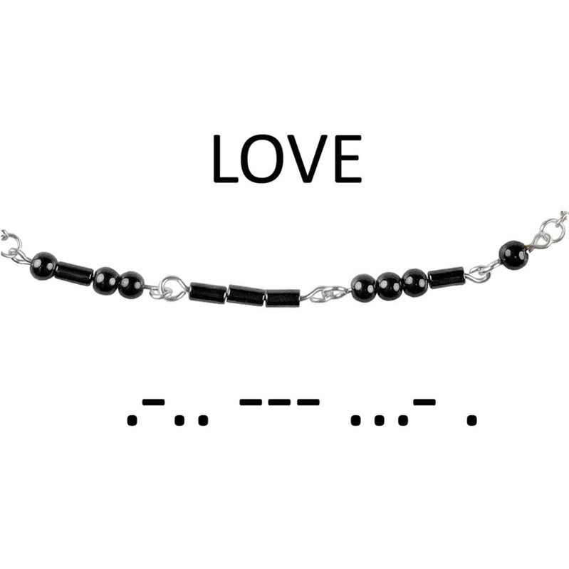 Detail van zwarte edelstenen ketting met zilver edelstaal en hematiet stenen die het woord LOVE in morse code weer geeft | Morse Code Love Black Hematite Silver