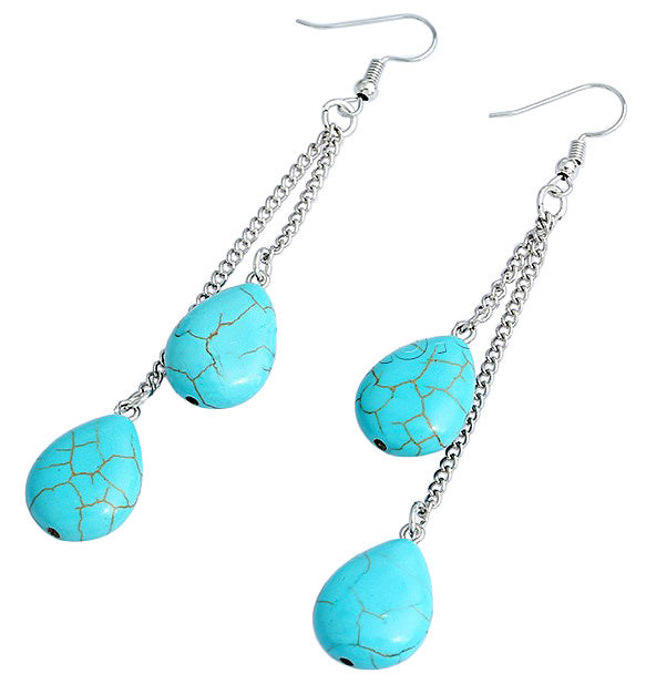 Lange edelstenen oorbellen met turkoois en sterling zilver (925) liggend | Double Drop Turquoise