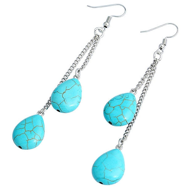 Lange edelstenen oorbellen met turkoois en sterling zilver (925) liggend | Double Drop Turquoise