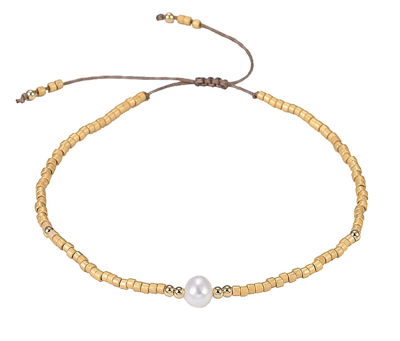 Wit zoetwater parel armband met gouden kraaltjes | Mini Pearl One Gold Color