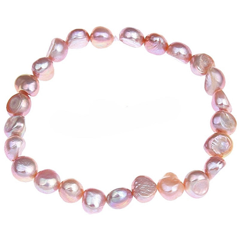 Zalm roze zoetwater parel armband, elastisch | Shinny Pearl Pink