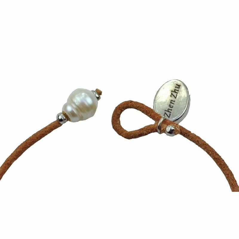 Slotje open van wit zoetwater parel armband met leer | Ibiza Orange