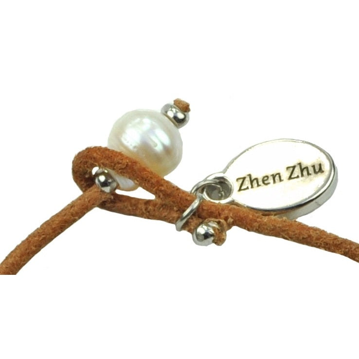 Slotje van wit zoetwater parel armband met leer | Ibiza Red