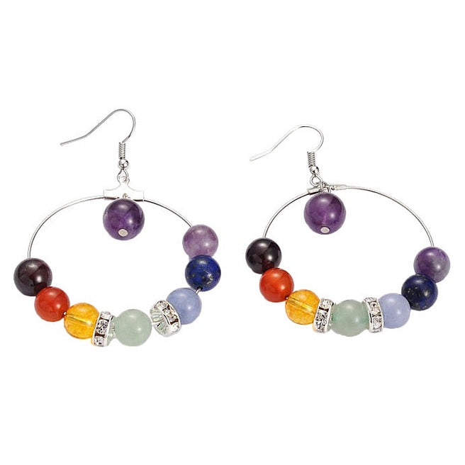 Edelstenen oorbellen in de kleuren van de verschillende chakra&
