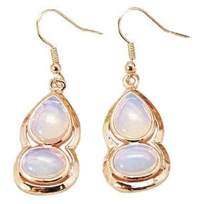 Licht blauwe edelstenen oorbellen met opaal en rosé goud | Sea Opal Gold