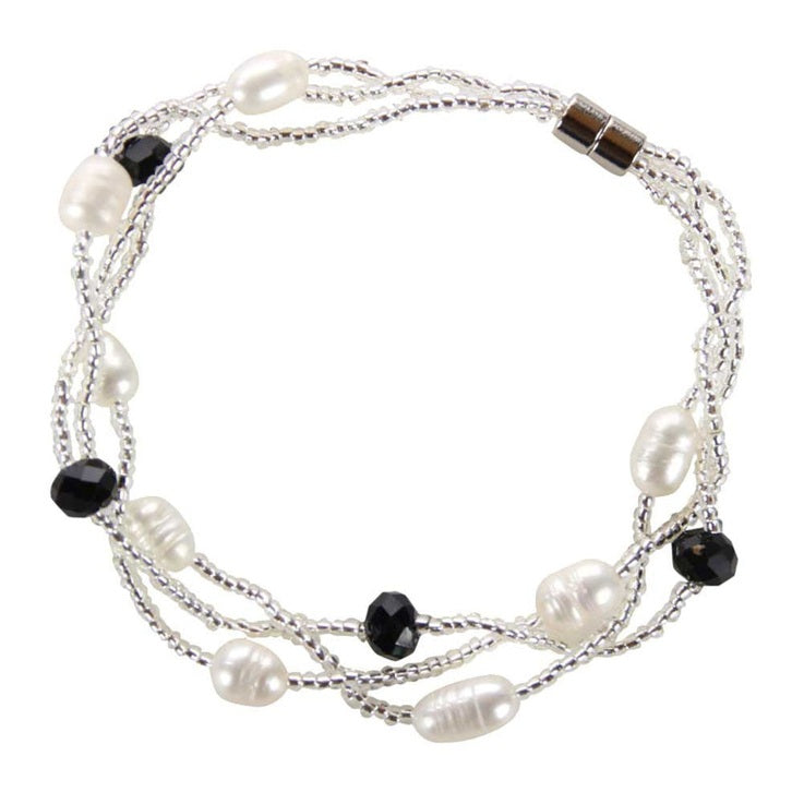 Wit zoetwater parel armband met zwart facet geslepen kristallen en magneetslotje | Twine Pearl Black Crystal