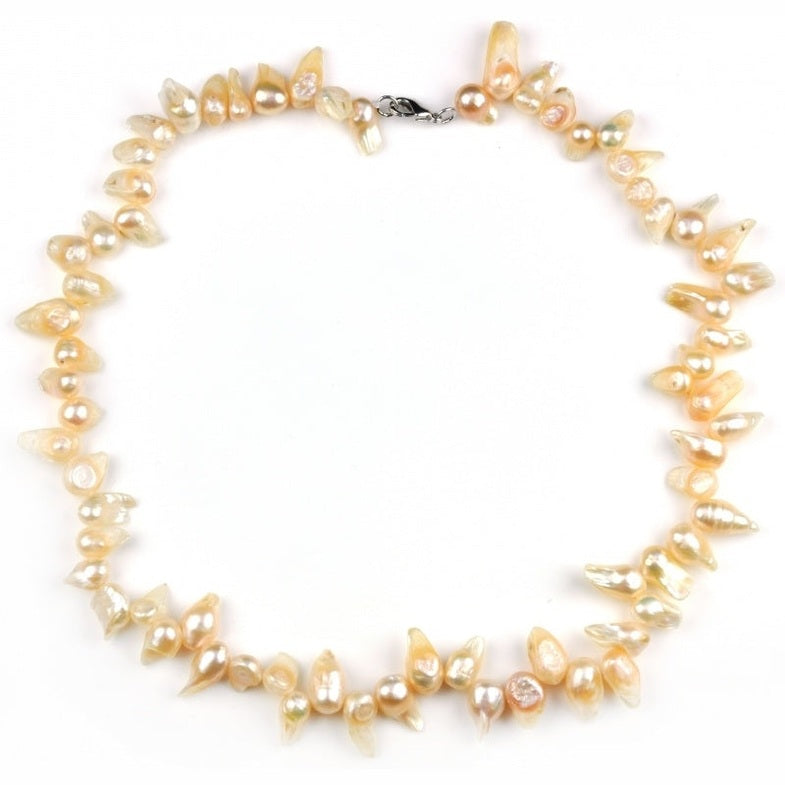 Zoetwater parelketting met zalm kleurige parels en sterling zilver (925) | Suzet