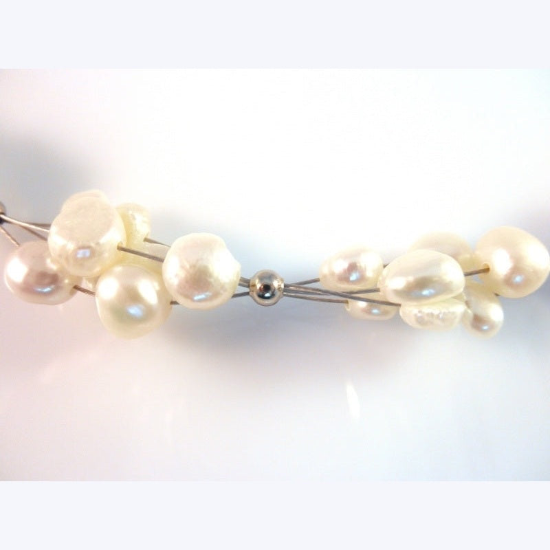 Detail van zoetwater parelketting met witte parels en sterling zilver (925) | Winny