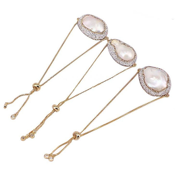 Wit zoetwater parel armband met grote witte parel en stras steentjes op een rij | Bright Golden Fireball