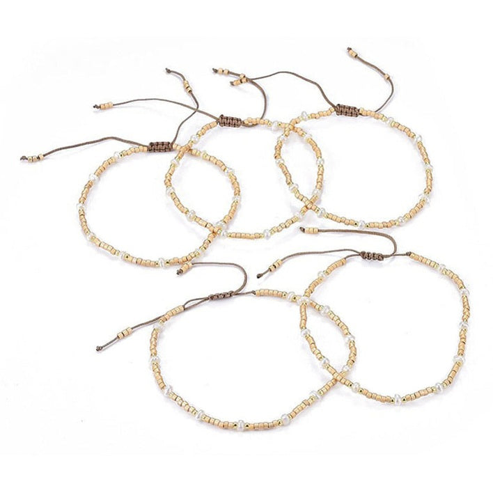 Wit zoetwater parel armband, schuifarmband met parels en goud | Mini Pearl Bead Gold