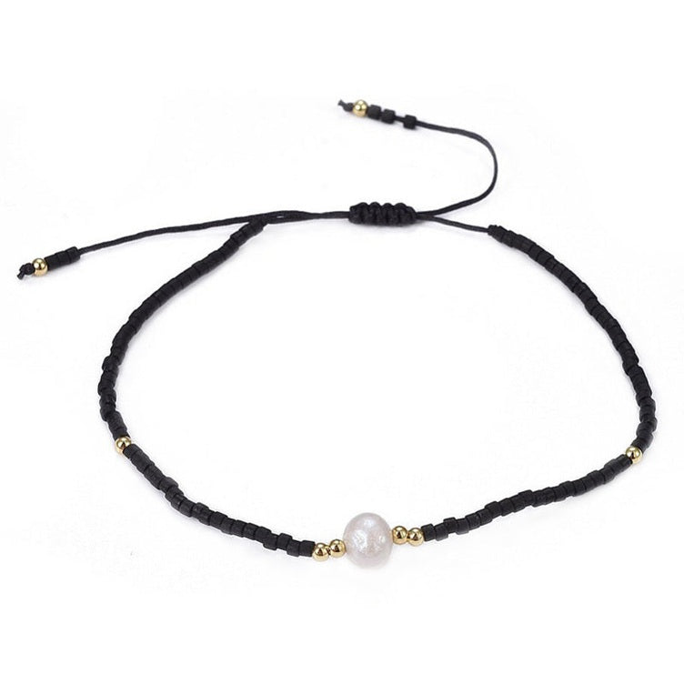 Wit zoetwater parelarmband met zwarte kraaltjes | Mini Pearl One Black Color
