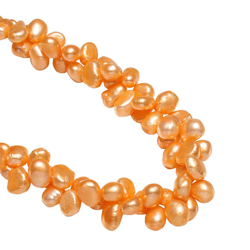 Detail van zoetwater parelketting met oranje parels in 2 rijen | Orange Babe