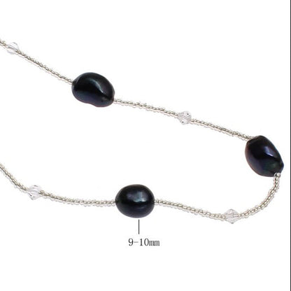 Detail van lange zoetwater parelketting met blauw zwarte parels | Black Pearl Sweater