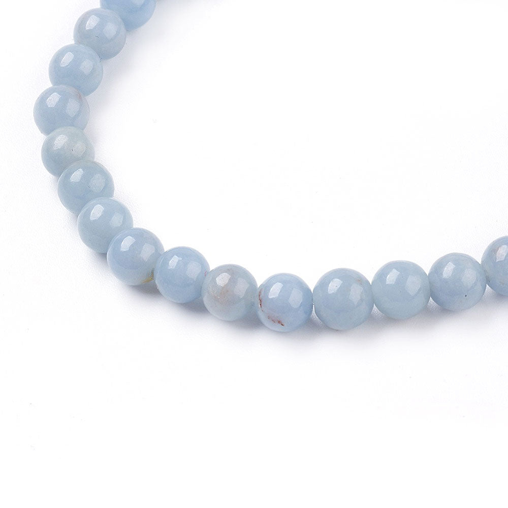 Detail van blauwe edelstenen armband met elastiek en angeliet | Angelite Small