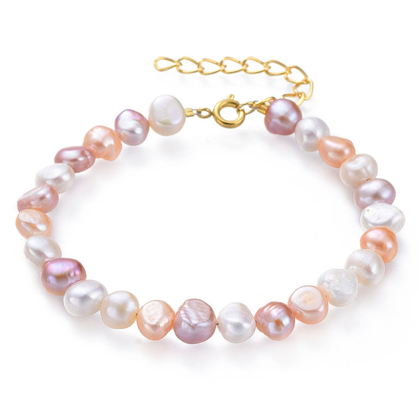 Zoetwater parel armband met witte, roze en zalm kleurige parels met goud edelstaal | Aza