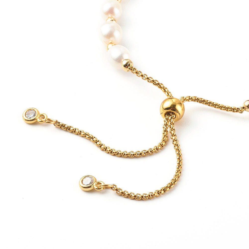 Slotje van wit zoetwater parel armband met goud edelstaal en schuif slotje | Efra