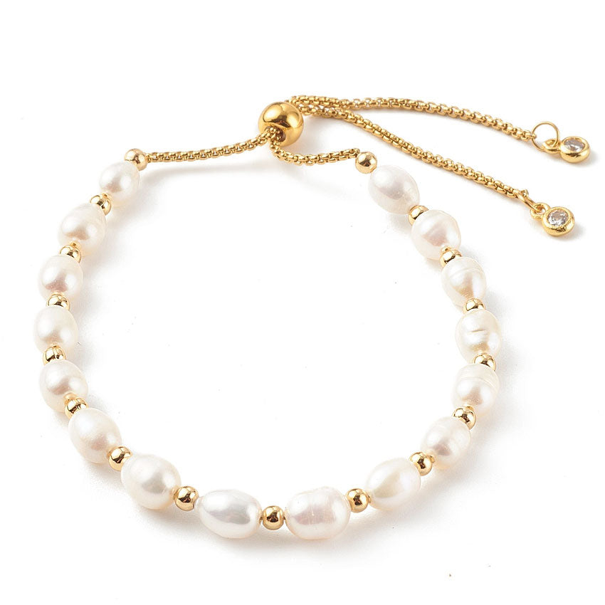 Wit zoetwater parel armband met goud edelstaal en schuif slotje | Efra
