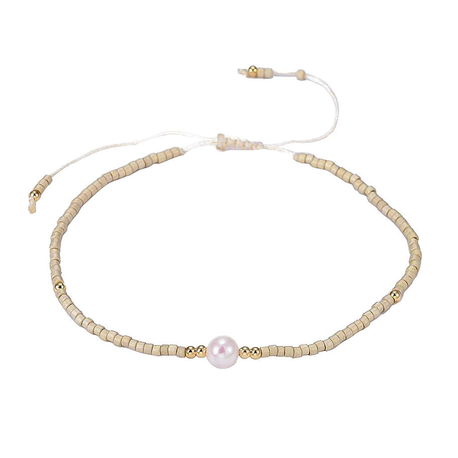 Wit zoetwater parel armbandje met creme kleurige kraaltje | Mini Pearl One Wheat Color