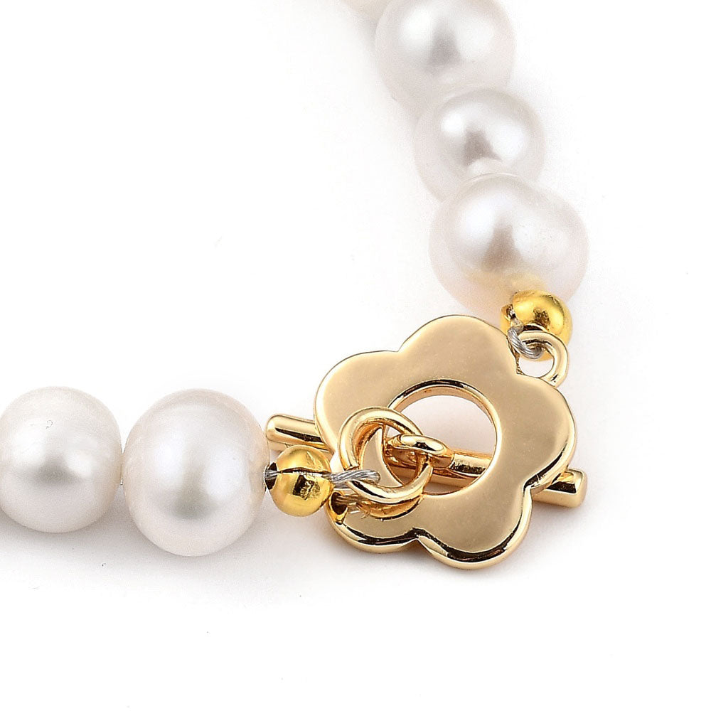 Slotje van wit zoetwater parel armband met gouden bloem | Pearl Golden Flower