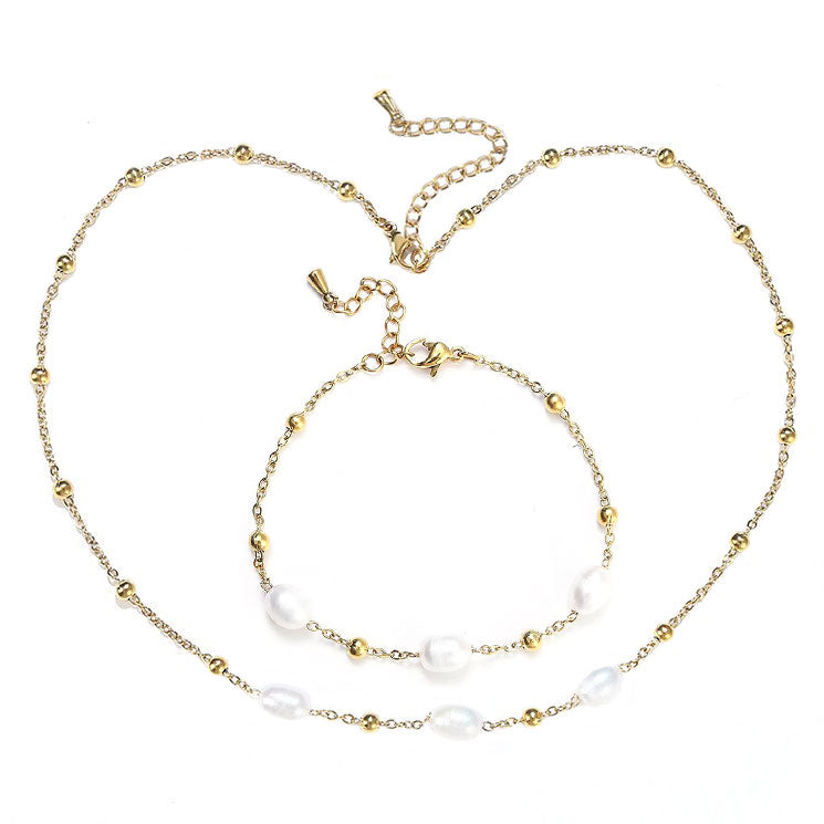 Witte zoetwater parelketting met goud edelstaal | Parelketting Eline Goud