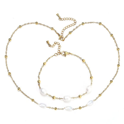 Witte zoetwater parelketting met goud edelstaal | Parelketting Eline Goud
