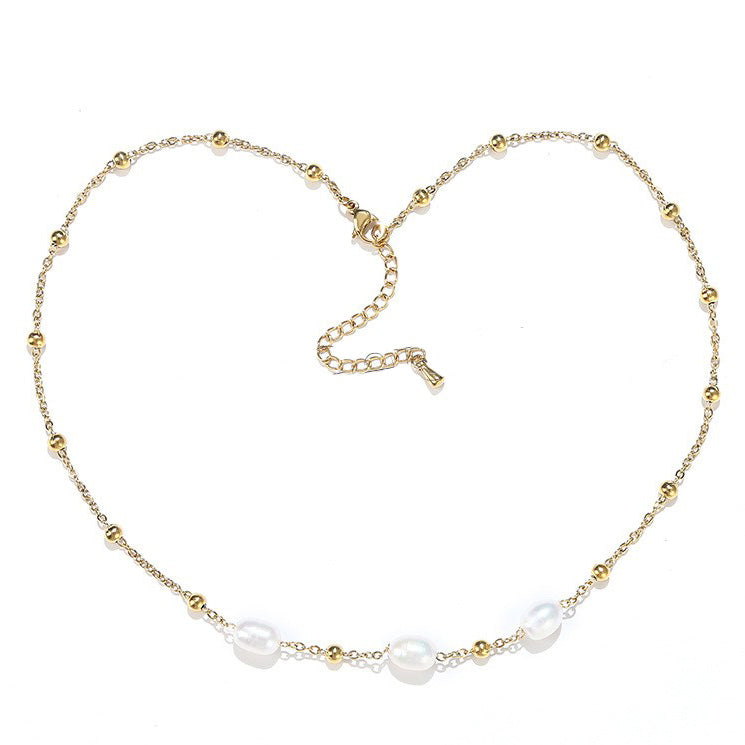 Witte zoetwater parelketting met goud edelstaal | Parelketting Eline Goud