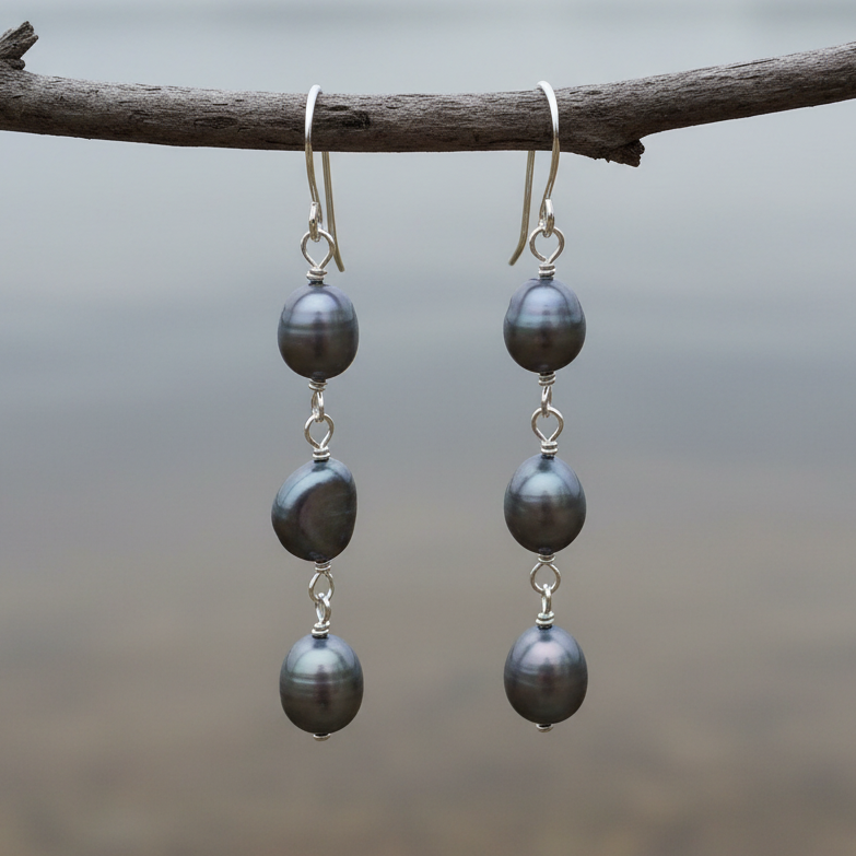 Lange zoetwater parel oorbellen met blauw paarse parels en sterling zilver (925) hangend aan takje | Dessa