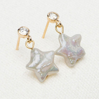 Zoetwater parel oorbellen met ster parel en stras steentje liggend | Bling Pearl Star Gold