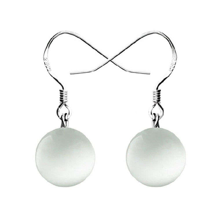 Witte edelstenen oorbellen met kattenoog en sterling zilver (925) | Dangling White Catās Eye