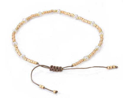 Wit zoetwater parel armband, schuifarmband, achterzijde | Mini Pearl Bead Gold