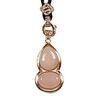 Detail van roze edelstenen ketting met rozenkwarts en rosé goud | Rosé Quartz Gold