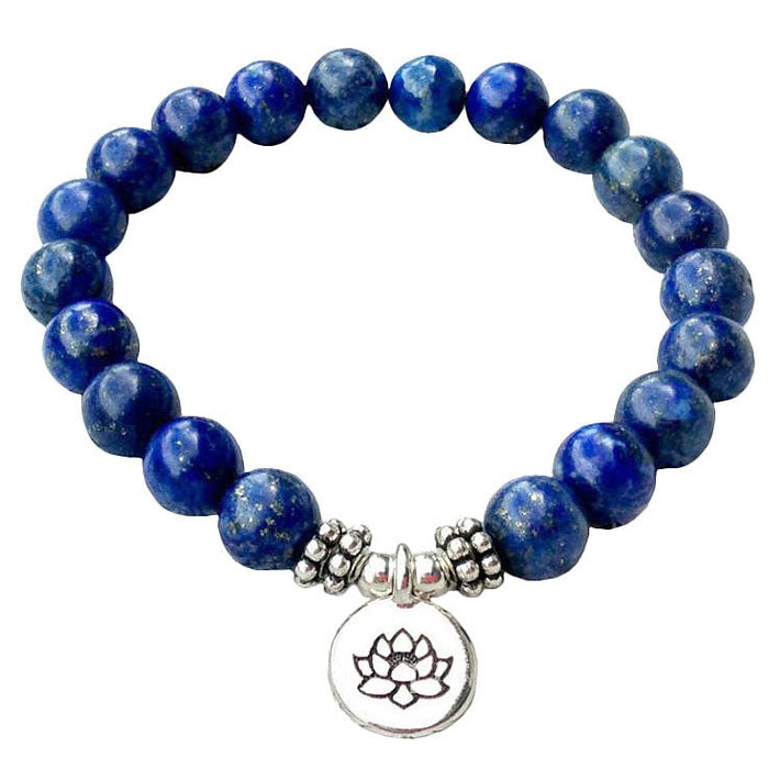 Blauwe edelstenen armband met lapis lazuli en zilver lotus bedeltje, elastisch armband