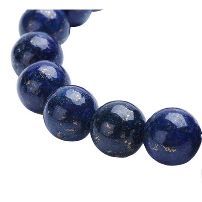 Ander detail van blauwe edelstenen armband met lapis lazuli, zilveren Boeddha en verschillende soorten en kleuren edelstenen | Elastisch | Lapis Lazuli Silver Buddha Gemstones