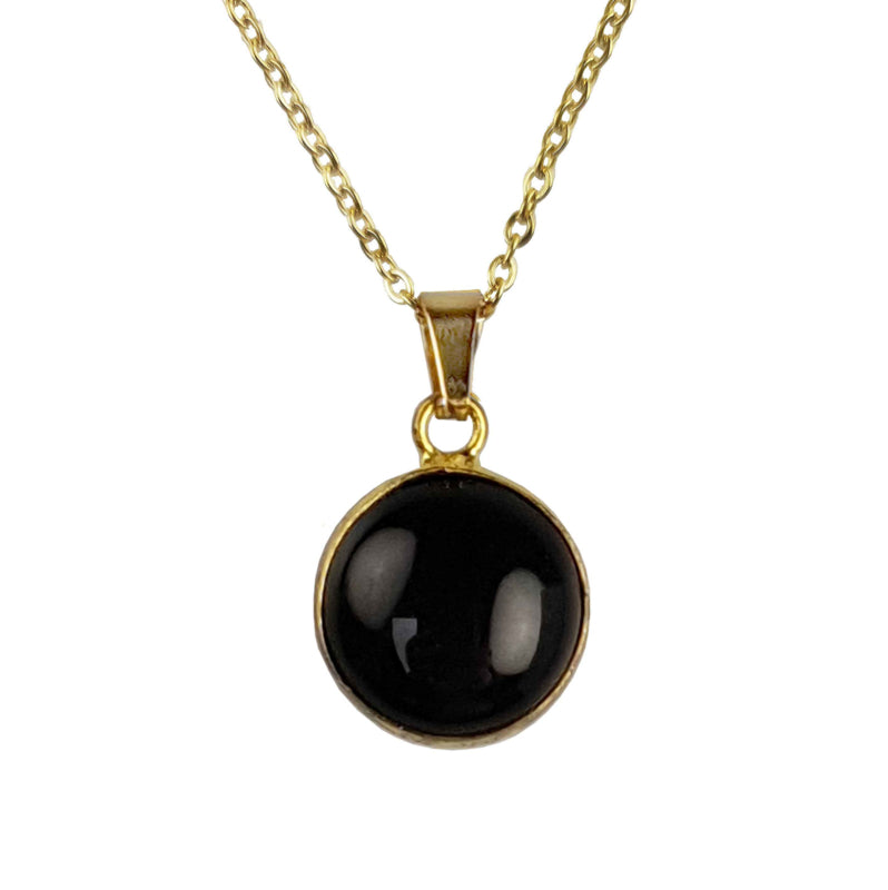 Detail van zwarte edelstenen ketting met agaat en goud edelstaal | set Black Agate Gold Round