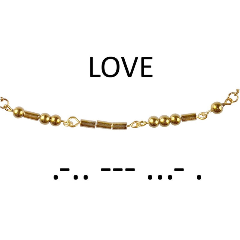 Detail van gouden edelstenen ketting met goud edelstaal en hematiet stenen die het woord LOVE in morse code weer geeft | Morse Code Love Gold Hematite