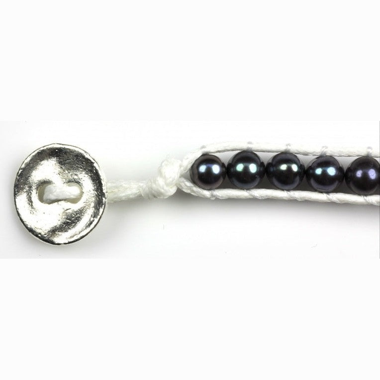 Slotje van zoetwater parel armband met blauw-paarse parels | Britney