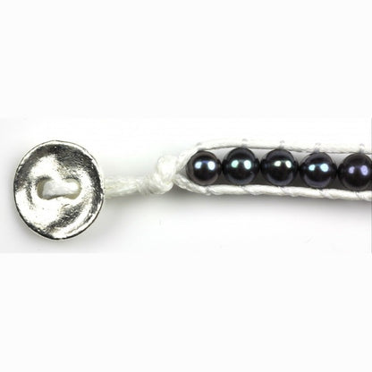 Slotje van zoetwater parel armband met blauw-paarse parels | Britney