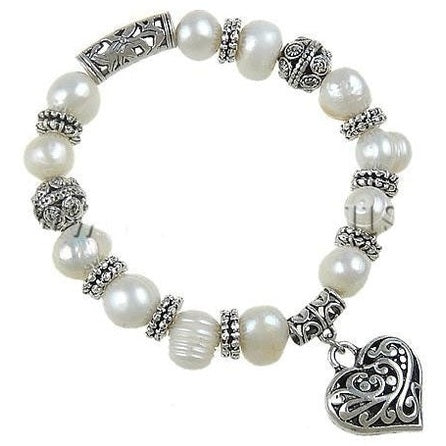 Wit zoetwater parel armband met een zilveren hartje | Marwy