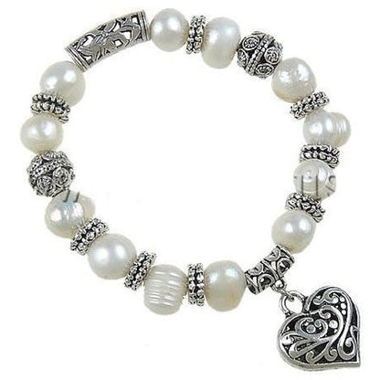 Wit zoetwater parel armband met een zilveren hartje | Marwy