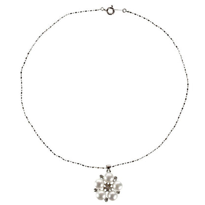 Zoetwater parelketting met witte parel hanger in bloem vorm met stras steentjes | Flower Bling